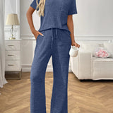 Helene - Elegant ribbed knit co-ord set with short-sleeve top and trousers