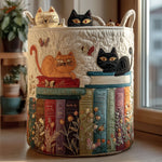 Quilted storage basket decorated with a parade of cats sitting on stacks of books with embroidered flowers