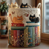 Quilted storage basket decorated with a parade of cats sitting on stacks of books with embroidered flowers