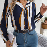 Quinivere - Elegant striped long-sleeve button-up blouse with wave pattern