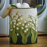 Quilted storage basket with lily of the valley design in green and white