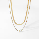 Claire – Elegant Double-Row Gold Necklace with a Contemporary Luster