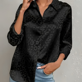 Quinasha - Elegant long-sleeve polo blouse with leopard print