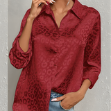 Quinasha - Elegant long-sleeve polo blouse with leopard print
