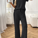 Helene - Elegant ribbed knit co-ord set with short-sleeve top and trousers