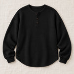Helene waffle-knit sweater in black