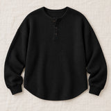 Helene waffle-knit sweater in black