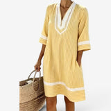 Kirsten™ Striped Tunic Dress" can be rephrased as "Kirsten™ Striped Tunic Style Dress.