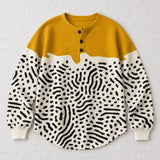 Liv yellow and white animal print sweater